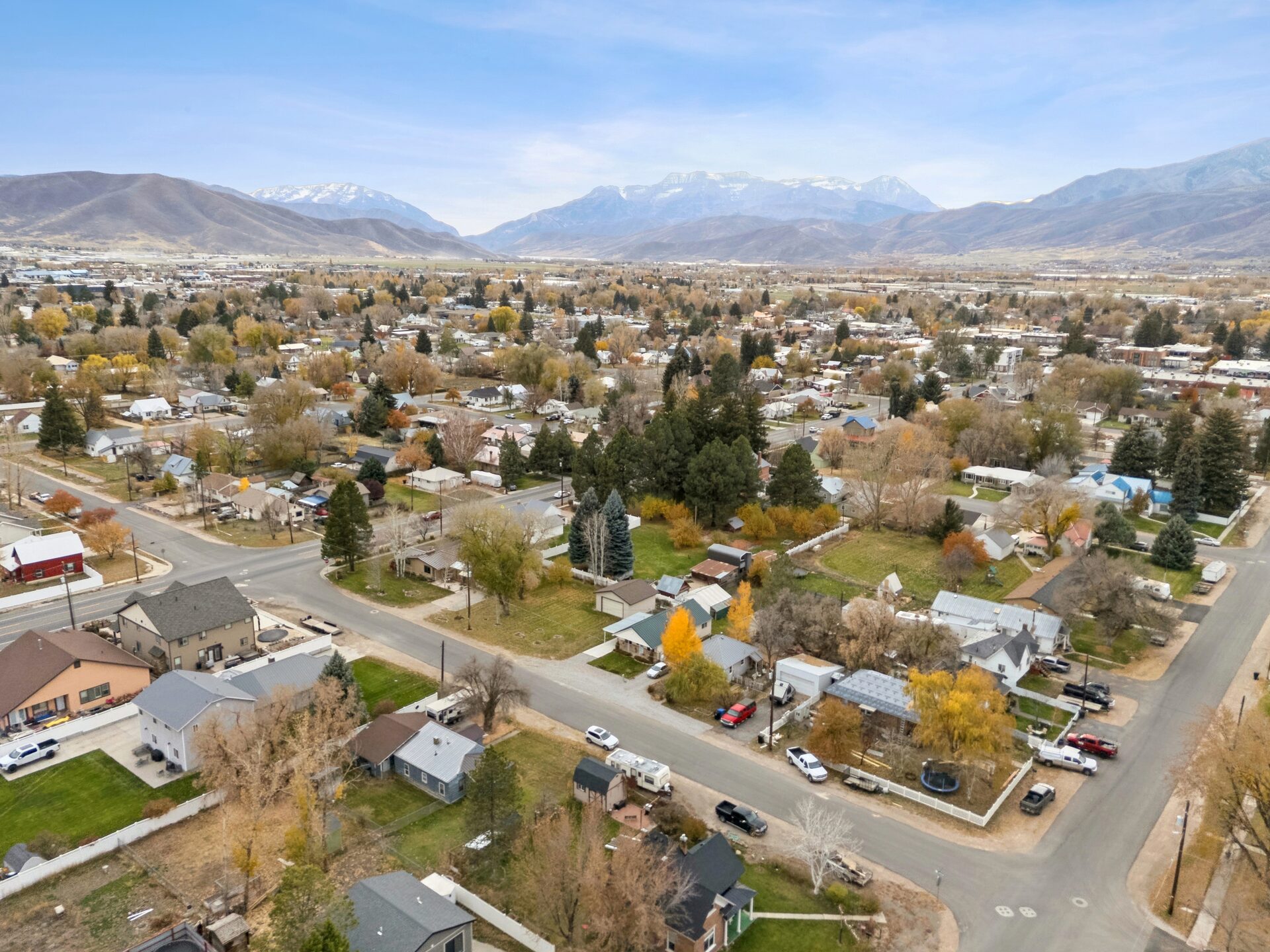 Aerial view of Heber City Utah neighborhoods with Wasatch mountains and Timpanogos in background